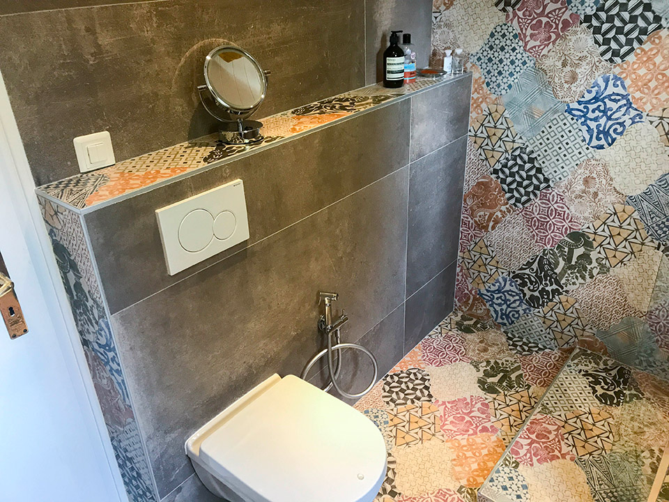 Renovation salles de bain et pose d'une crédence en écaille à Genève